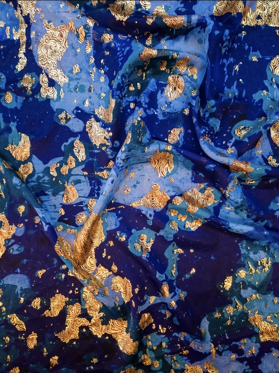 Indian silk fabrics with golden foil