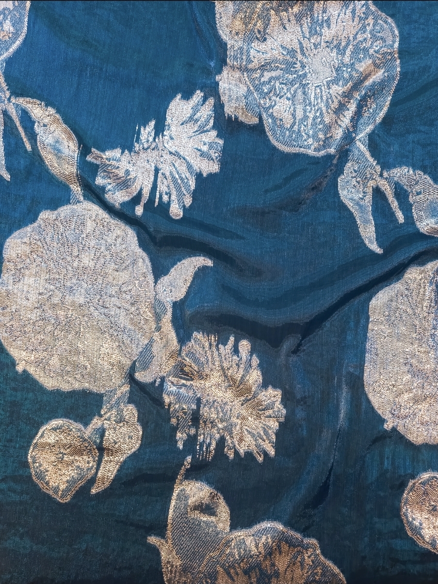 Organza fabrics with metallic floral embroidery
