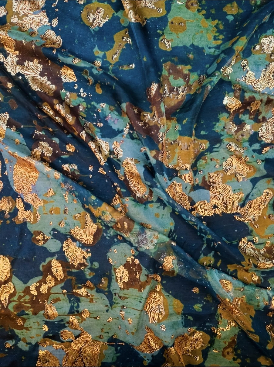 Indian silk fabrics with golden foil