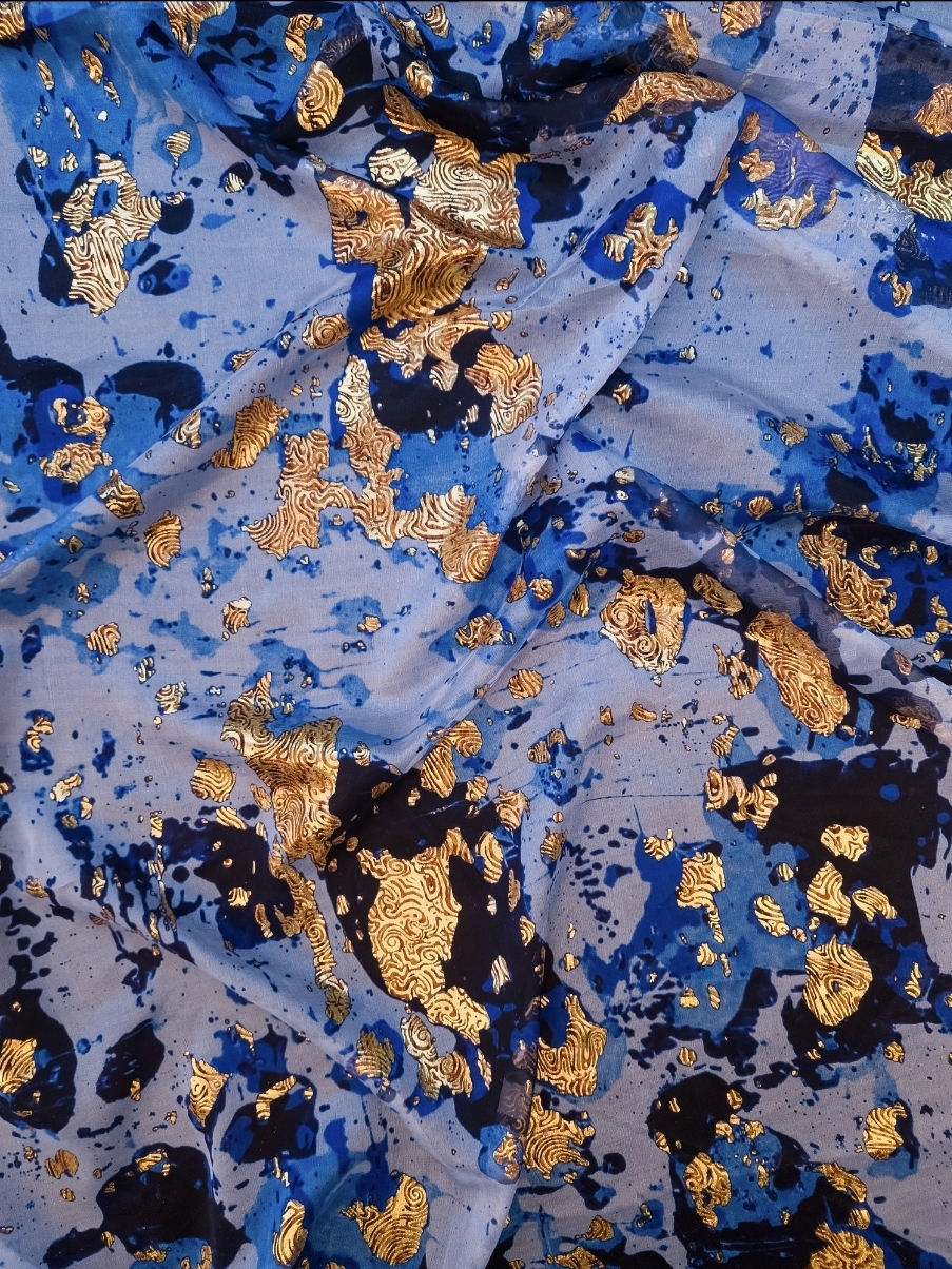 Indian silk fabrics with golden foil