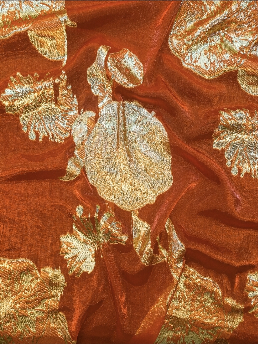 Organza fabrics with metallic floral embroidery